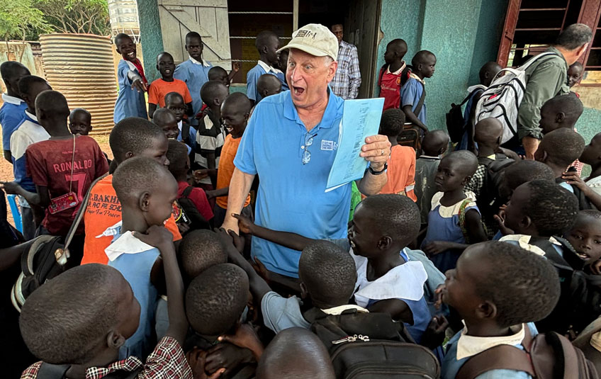 FMSC CEO Mark Crea interacting with kids in Nakwanya, Uganda