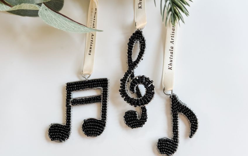 Treble clef, single eighth note and double eighth note music note ornaments 