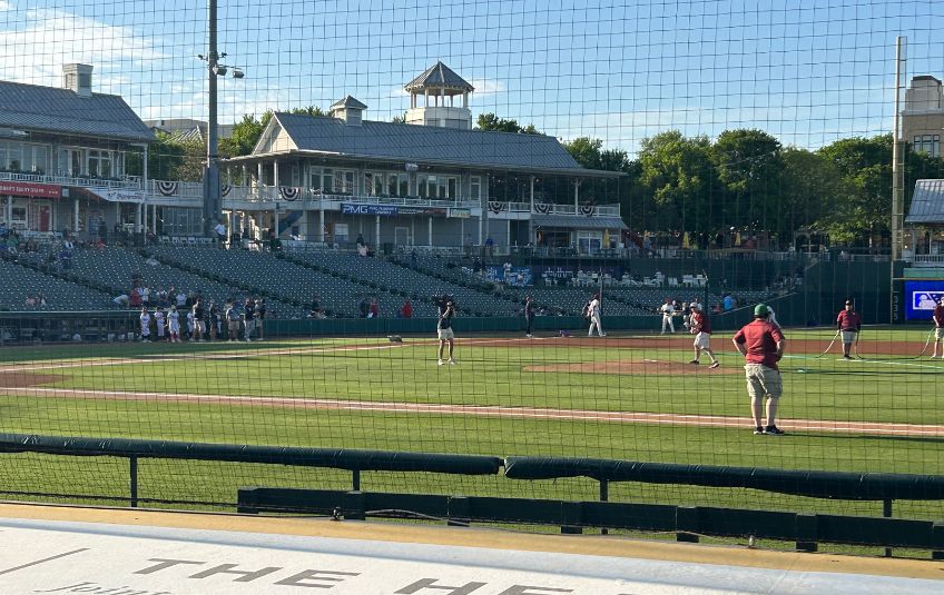 FMSC Richardson super volunteer Tyler throwing the first pitch at a Frisco RoughRiders game.