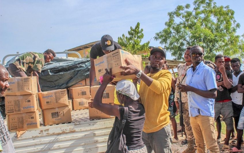 unloading boxes from a truck